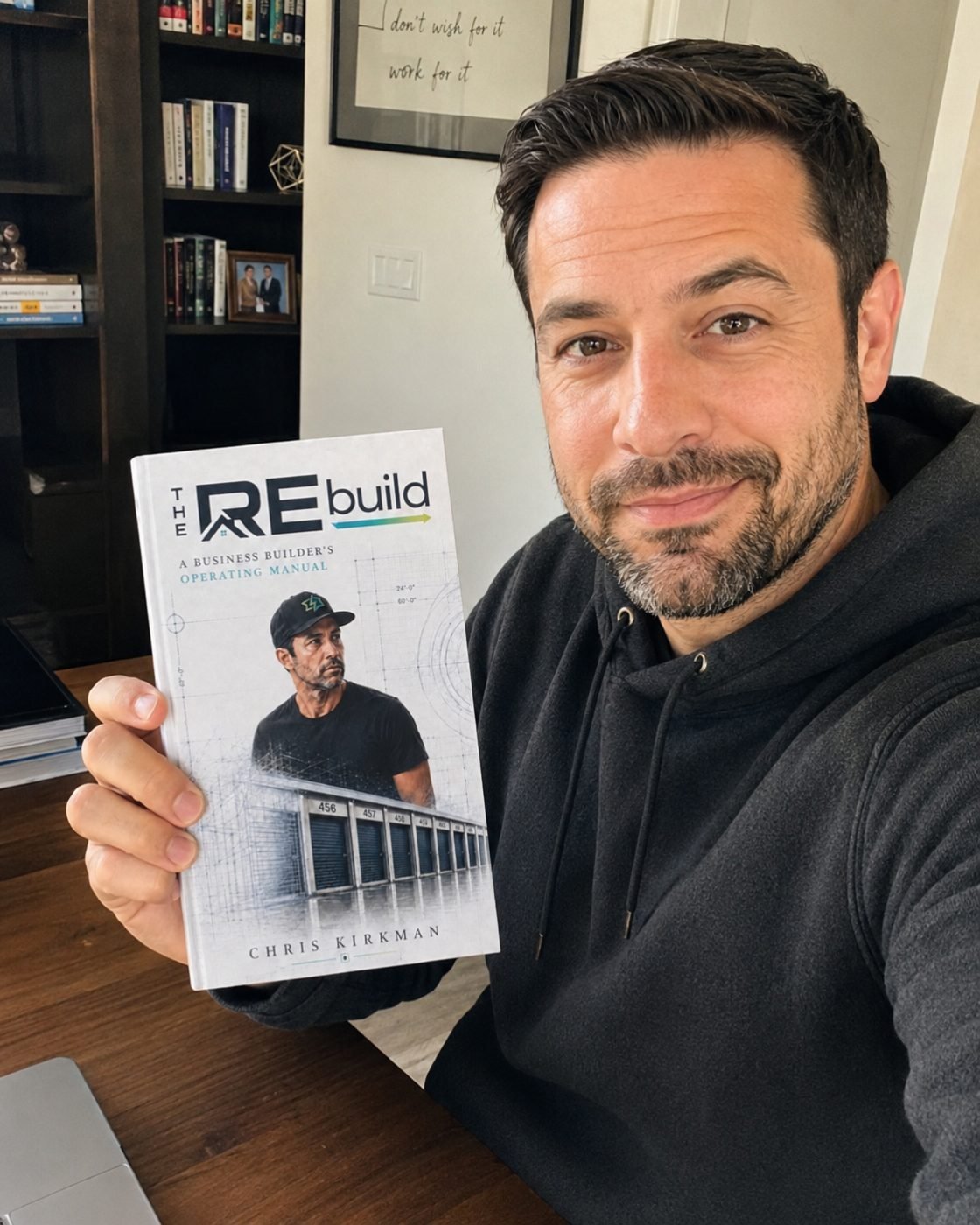 A REal Circle member holding The REbuild
